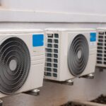 Air conditioners mounted on wall outdoors
